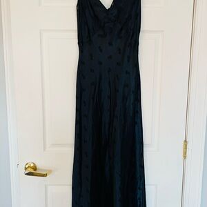 Elegant Black Sleeveless satin maxi dress.